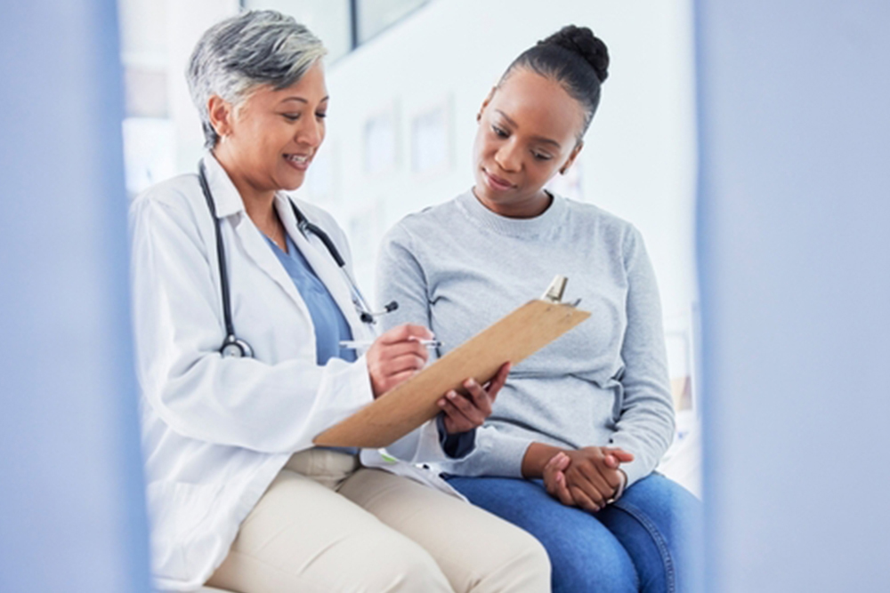 Doctor, women and checklist in healthcare support, hospital services and patient history, charts or results. Senior nurse writing on clipboard for registration, clinic sign up or medical consultation